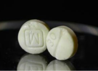 ایم لیٹر کے ساتھ پیلی گولی۔